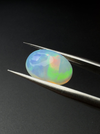 Opal naturalny kaboszon owal 13,26 x 9,13 mm