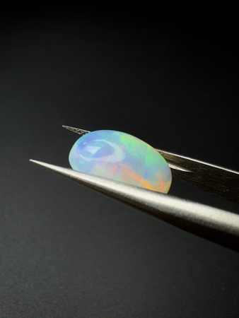 Opal naturalny kaboszon owal 13,26 x 9,13 mm