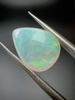 Opal naturalny kaboszon gruszka 13,91 x 10,83 mm