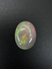 Opal ciemny naturalny kaboszon owal 14,07 x 11,11 mm