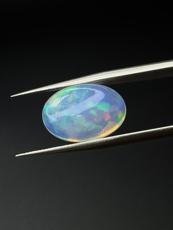 Opal naturalny kaboszon owal 15,3 x 10,5 mm