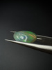 Opal ciemny naturalny kaboszon trylion 11,70 mm