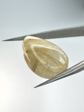 Kwarc z rutylem łezka kaboszon 23,1x14,7 mm
