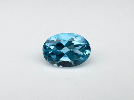 Topaz niebieski owal fasetowany 7x5 mm