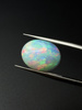 Opal naturalny kaboszon owal 15,09 x 11,80 mm