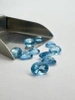 Niebieski topaz owal fasetowany 8x6 mm
