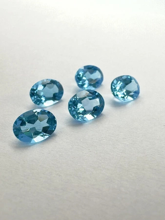 Niebieski topaz owal fasetowany 8x6 mm
