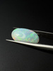 Opal naturalny kaboszon owal 15,09 x 11,80 mm