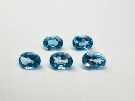 Niebieski topaz owal fasetowany 8x6 mm