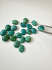 Turkus naturalny kaboszon owal 12x10 mm