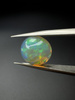 Opal ciemny naturalny kaboszon owal 13,15 x 11,48 mm