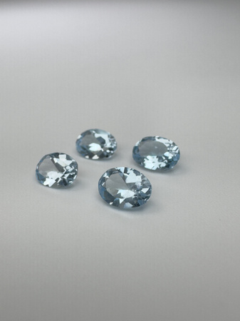 Topaz niebieski naturalny fasetowany owal 6x4 mm