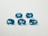 Niebieski topaz owal fasetowany 8x6 mm