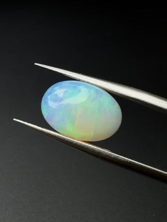 Opal naturalny kaboszon owal 13,26 x 9,13 mm