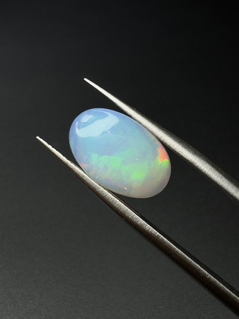 Opal naturalny kaboszon owal 14,25 x 9,11 mm