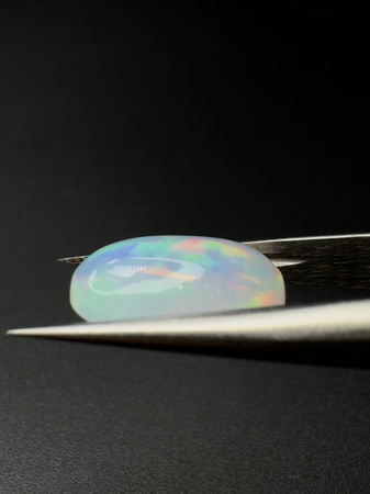 Opal naturalny kaboszon owal 14,25 x 9,11 mm