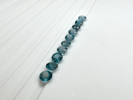 Topaz london blue fasetowany okrągły fi 5 mm