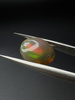 Opal ciemny naturalny kaboszon owal 13,61 x 11,45 mm