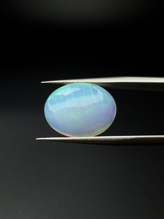 Opal naturalny kaboszon owal 14,93 x 11,66 mm