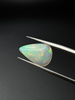 Opal naturalny kaboszon gruszka 16,55 x 10,70 mm