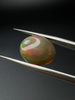 Opal ciemny naturalny kaboszon owal 13,61 x 11,45 mm