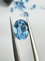 Niebieski topaz owal fasetowany 8x6 mm
