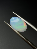 Opal naturalny kaboszon owal 14,25 x 9,11 mm