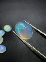 Opal naturalny kaboszon owal 10 x 8 mm