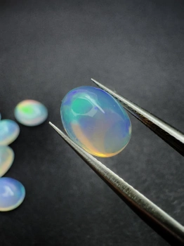 Opal naturalny kaboszon owal 10 x 8 mm