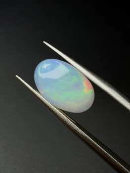 Opal naturalny kaboszon owal 14,25 x 9,11 mm