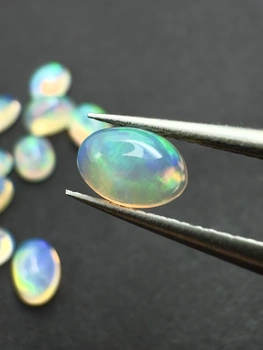 Opal naturalny kaboszon owal 6x4 mm