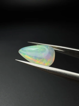 Opal naturalny kaboszon gruszka 16,55 x 10,70 mm