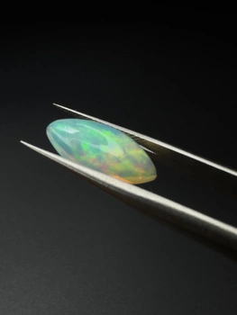 Opal naturalny kaboszon markiza 15,91 x 7,55 mm