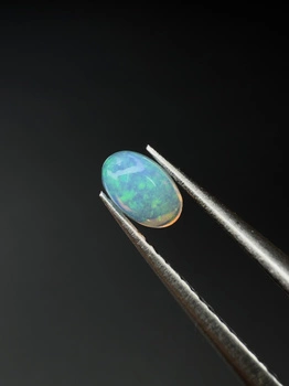 Opal naturalny owal kaboszon 5x3 mm